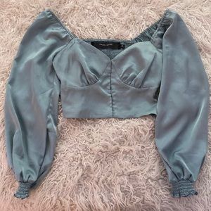Satin light blue long sleeved crop top